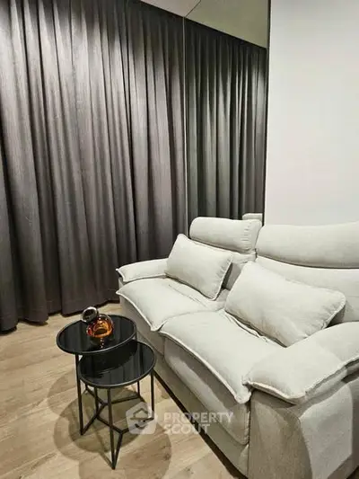 Modern living room with cozy sofa and elegant side table