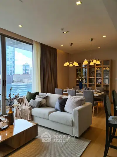 Luxurious modern living room with elegant dining area and city view, perfect for urban living.