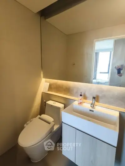 Modern bathroom with sleek fixtures and ambient lighting