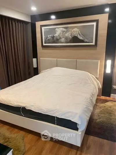 Cozy bedroom with modern decor and elegant lighting