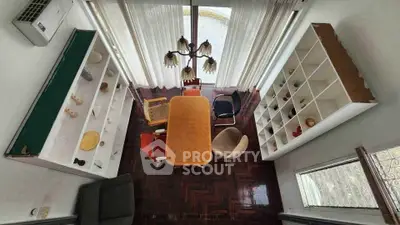 Charming dining area with eclectic chairs and natural light