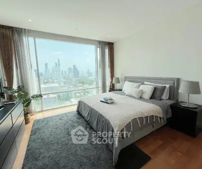 Luxurious bedroom with stunning city view and modern decor