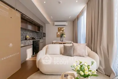 Luxurious modern living room with elegant decor and open kitchen layout