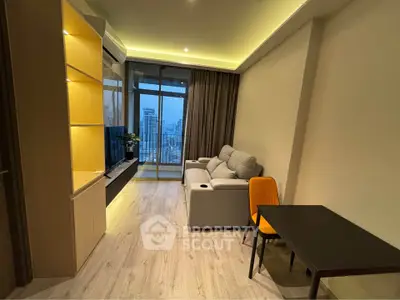 Modern living room with city view, cozy sofa, and sleek furniture design.