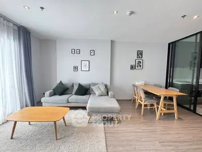 Modern living room with stylish furniture and natural light