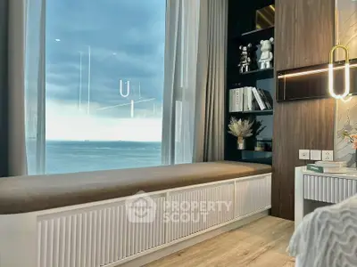 Luxurious modern living room with stunning ocean view and elegant decor