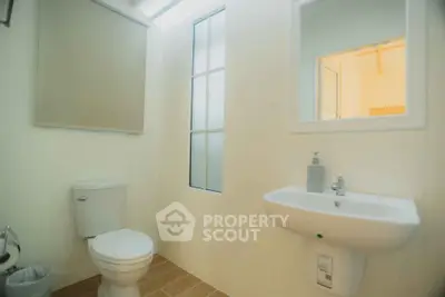 Modern bathroom with sleek fixtures and natural light