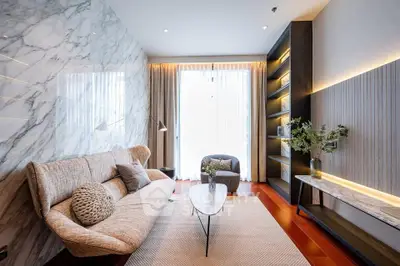 Luxurious modern living room with elegant marble wall and stylish furniture