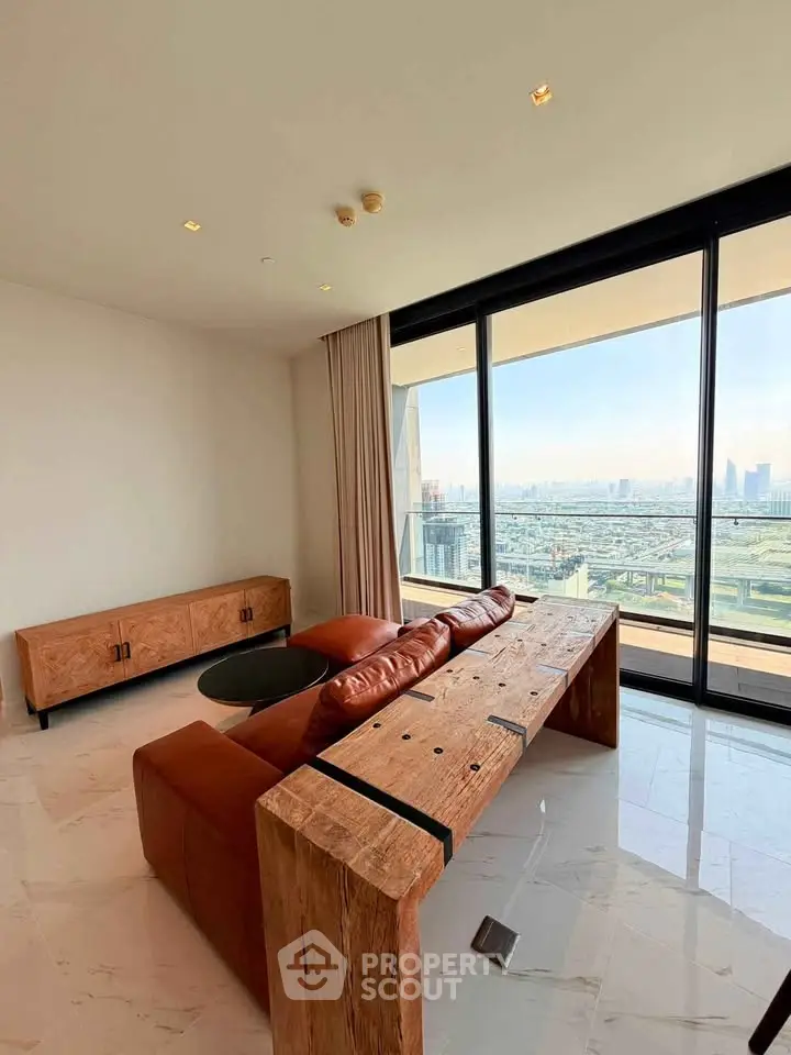 Luxurious living room with stunning city view and elegant wooden furniture