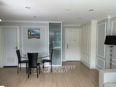 Spacious modern living room with elegant dining area and stylish decor