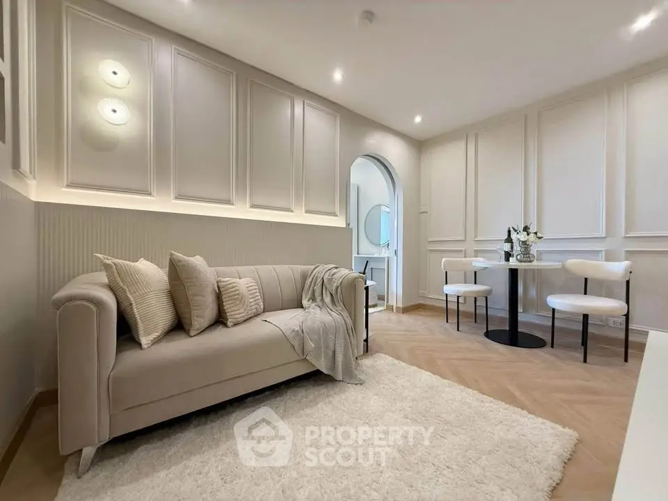 Elegant living room with modern decor and cozy seating area