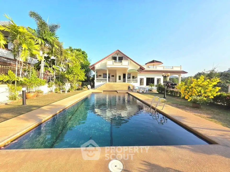 Luxurious villa with private pool and lush garden, perfect for serene living.