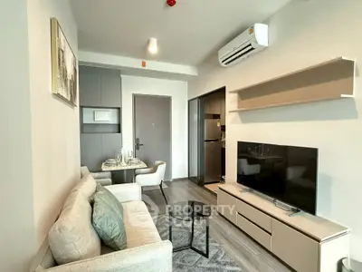 Modern living room with sleek furniture and air conditioning in a stylish apartment.