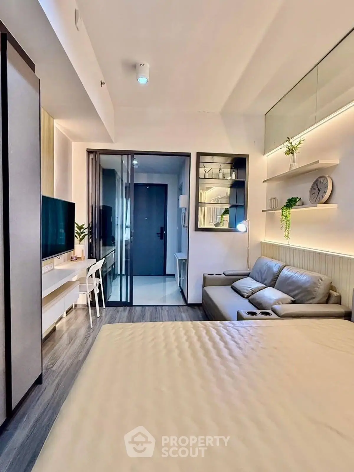 Modern studio apartment with sleek design and cozy living area