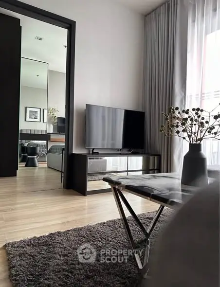 Modern living room with sleek TV unit and stylish decor