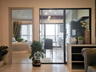 Modern open-plan living space with stylish decor and natural light