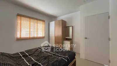 Cozy bedroom with modern wooden furniture and natural light