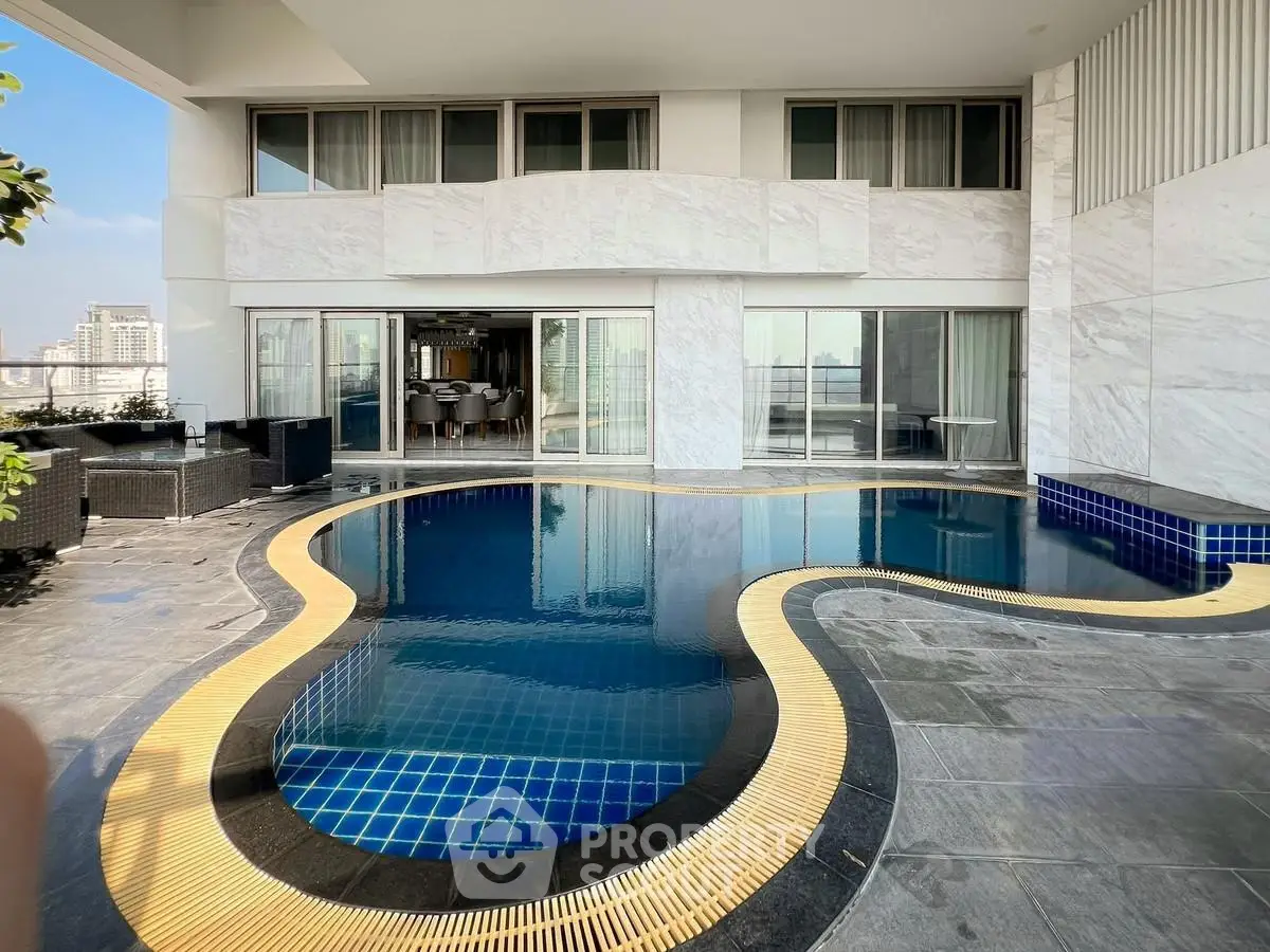 Luxurious modern apartment with private pool and spacious terrace offering stunning city views.