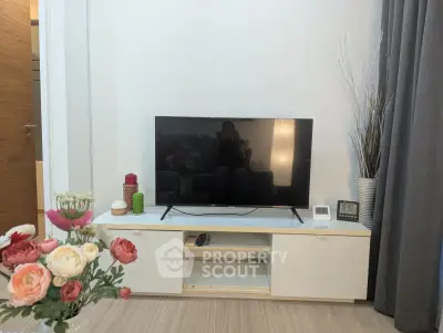 Modern living room with sleek TV setup and stylish decor