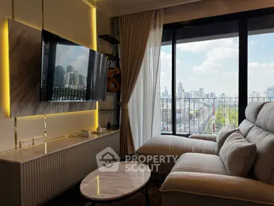 Modern living room with city view, featuring stylish sofa and wall-mounted TV.