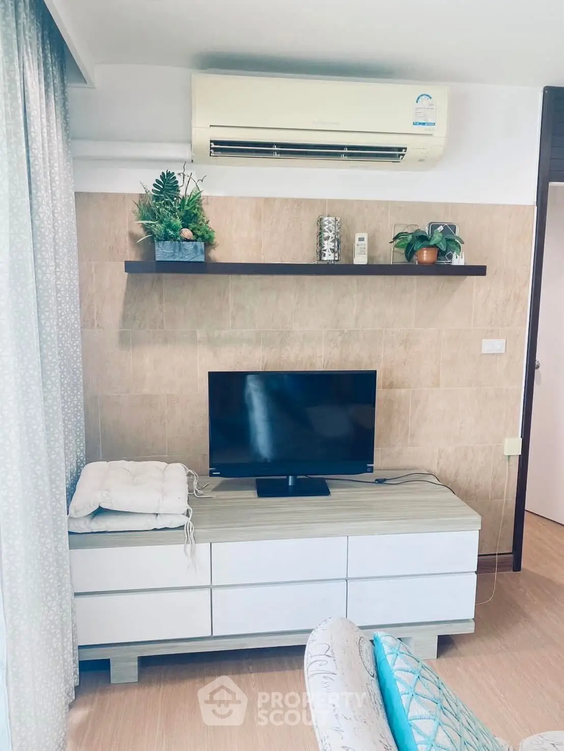 Modern living room with air conditioning and stylish decor