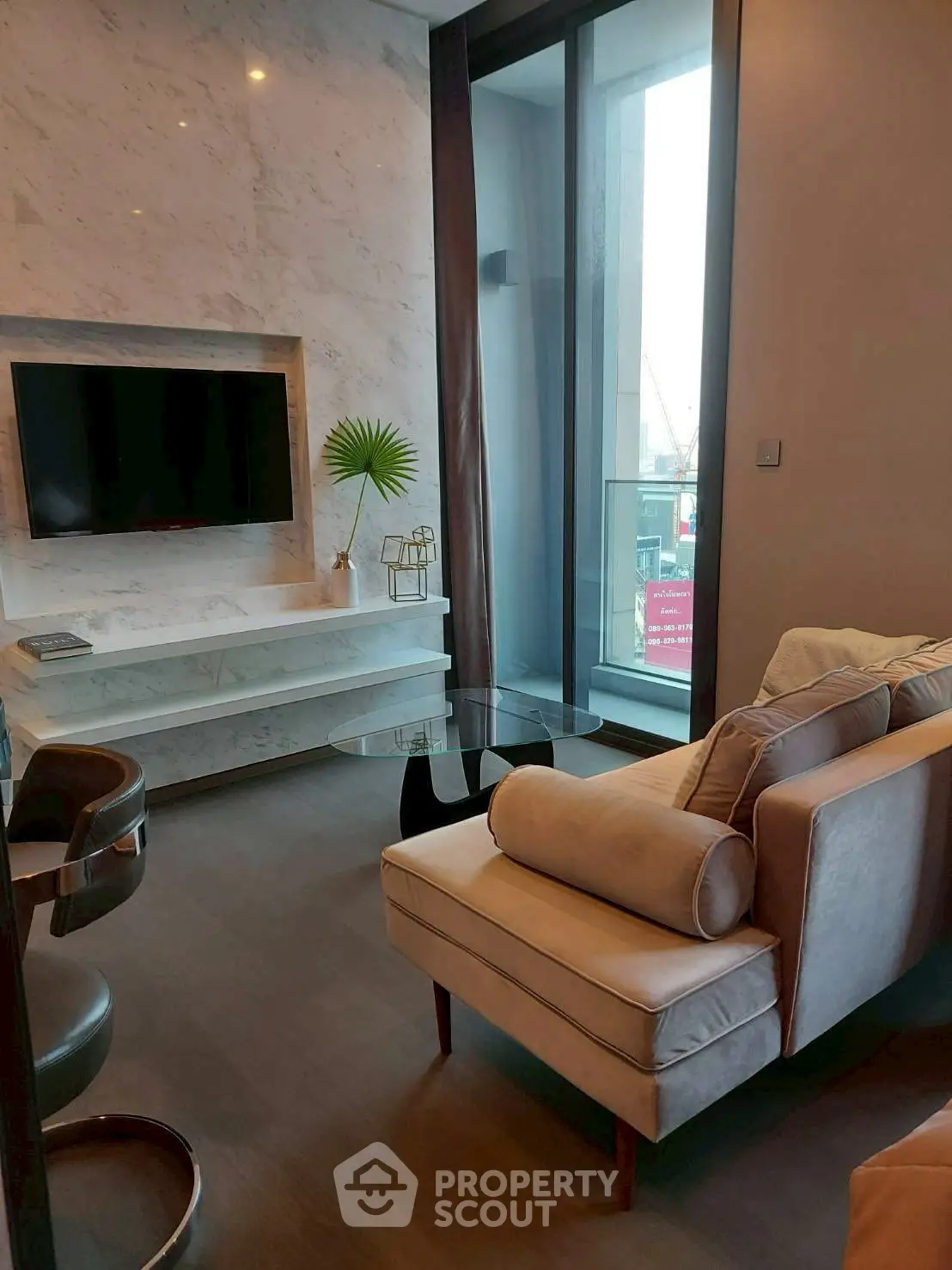 Modern living room with elegant decor and large window view