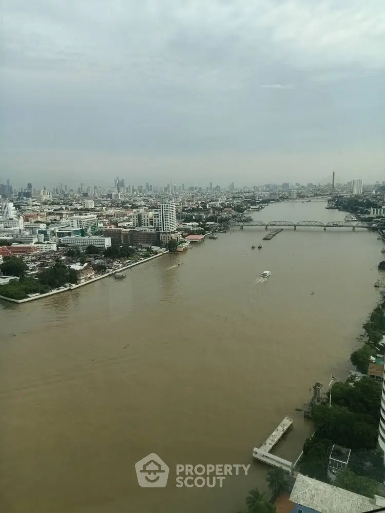 Stunning river view from high-rise building in bustling cityscape