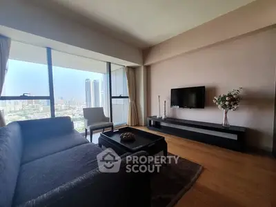 Spacious living room with city view and modern decor