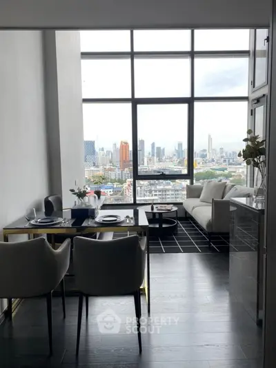Modern living room with stunning city view, elegant dining area, and sleek furniture in a high-rise apartment.