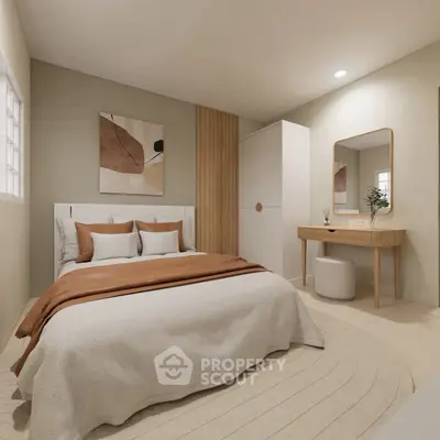 Elegant bedroom with modern decor, featuring a cozy bed, stylish artwork, and a chic vanity area.