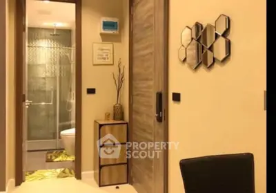 Modern bathroom with stylish decor and sleek fixtures in a contemporary apartment.