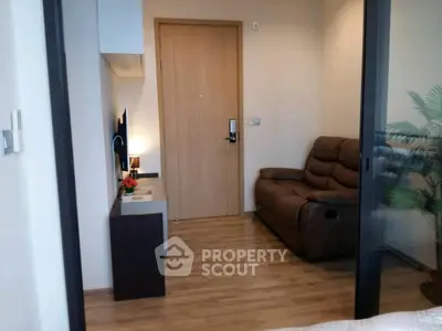 Cozy small living room with modern decor and comfortable seating