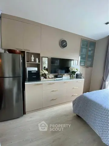 Modern bedroom with built-in storage and sleek design