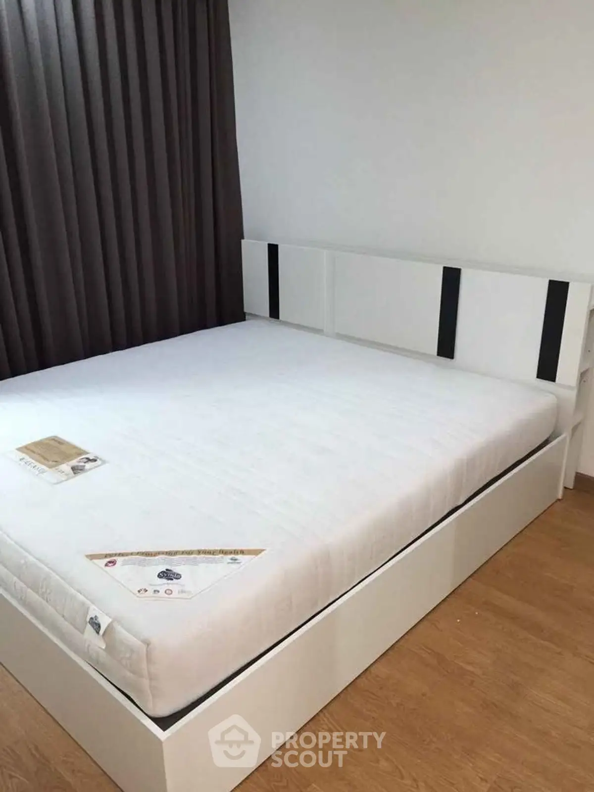 Modern bedroom with minimalist design and comfortable bed