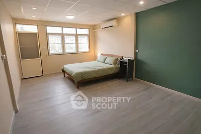 Spacious bedroom with modern design and natural light