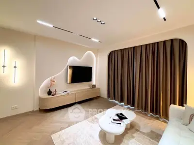 Modern living room with stylish lighting and elegant decor