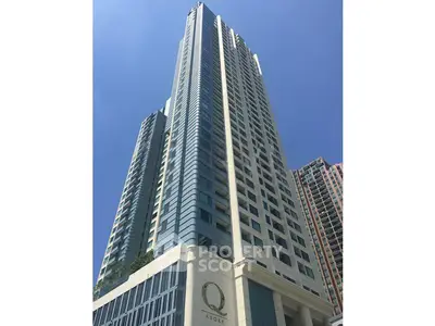 Stunning high-rise building with modern architecture and panoramic city views.