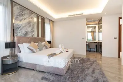 Luxurious modern bedroom with elegant decor and plush furnishings
