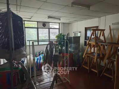 Spacious storage room with natural light and organized layout