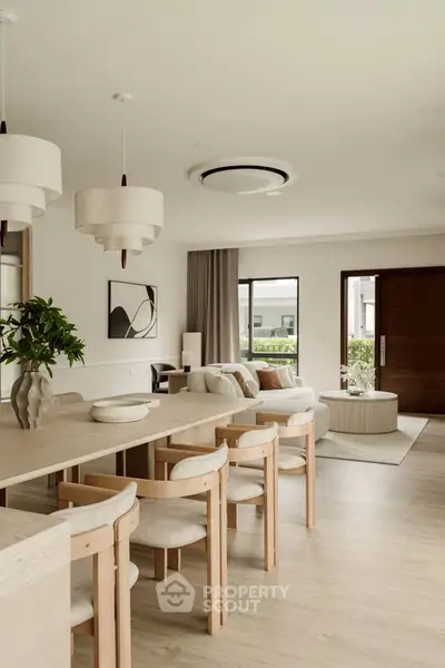 Spacious modern living room with elegant decor and natural light
