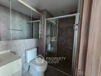 Modern bathroom with glass shower and sleek design