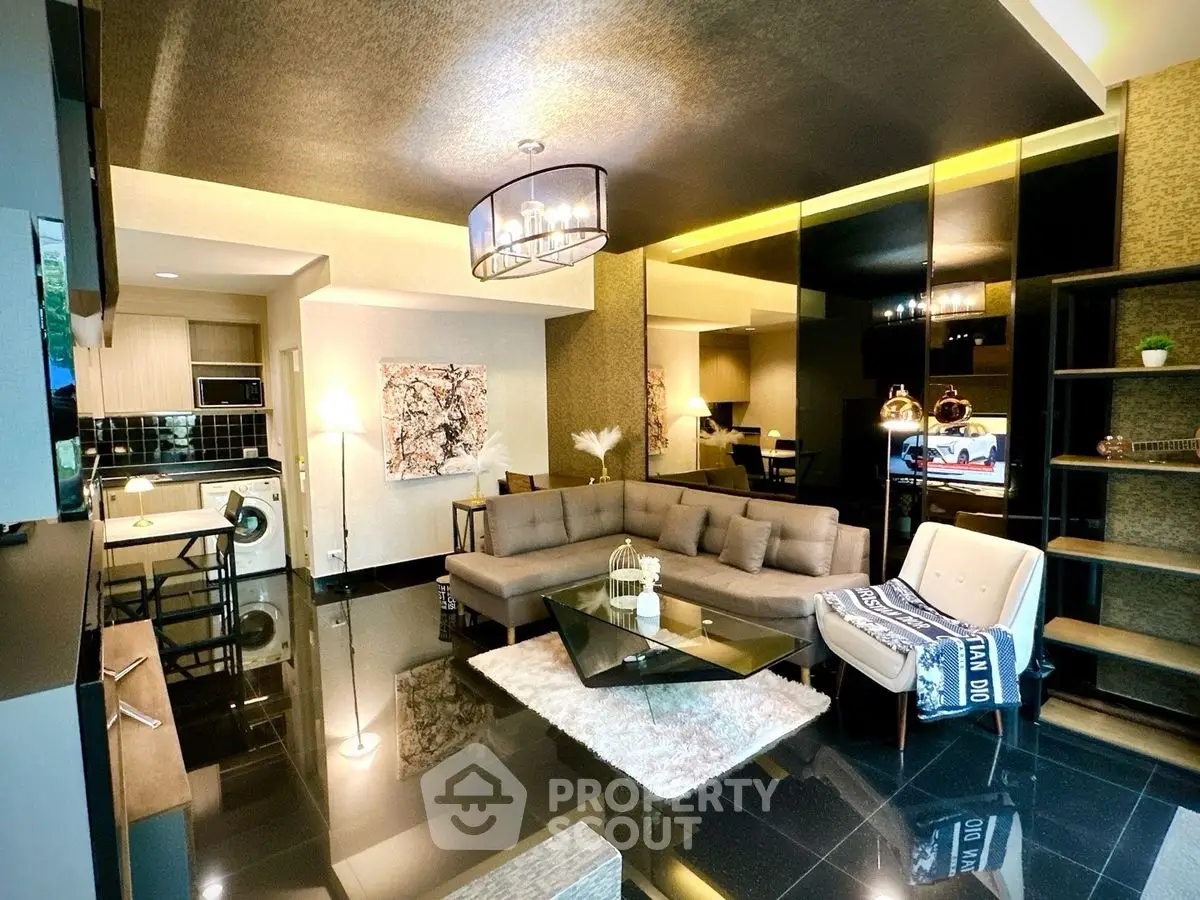 Luxurious modern living room with elegant decor and open kitchen layout