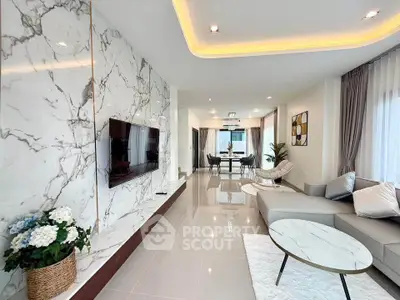 Luxurious modern living room with marble accents and elegant decor