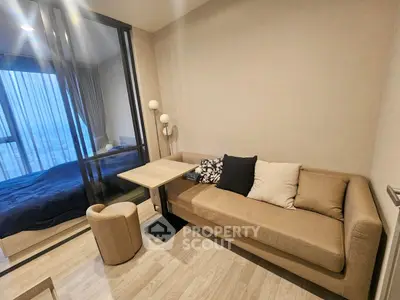 Modern living room with cozy sofa and stylish decor in a high-rise apartment