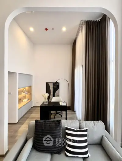 Modern living room with high ceilings and elegant decor