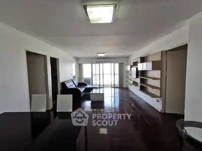 Spacious living room with modern furniture and open layout, perfect for entertaining.