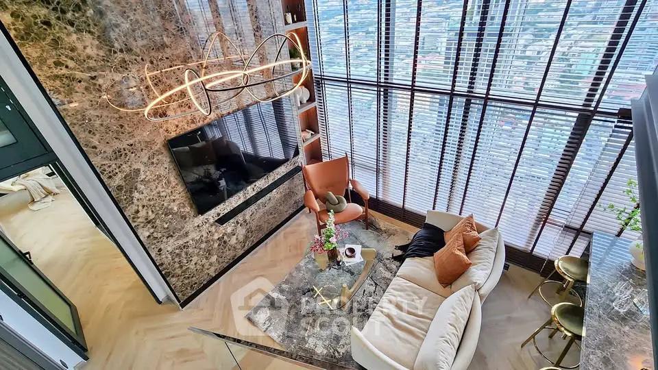 Luxurious modern living room with marble accents and panoramic city view