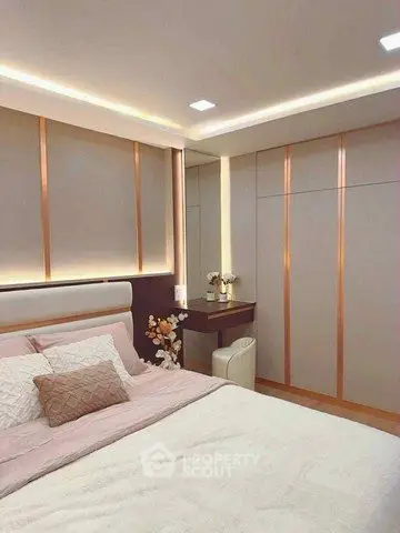 Luxurious modern bedroom with elegant lighting and stylish decor