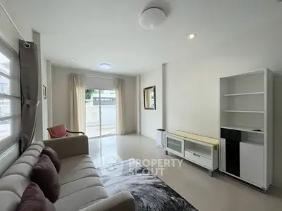 Spacious modern living room with elegant decor and natural light