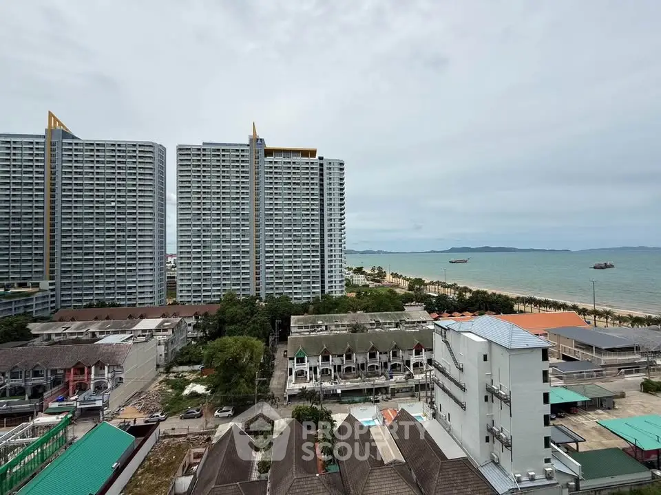 Stunning beachfront high-rise buildings with ocean view in a prime coastal location.